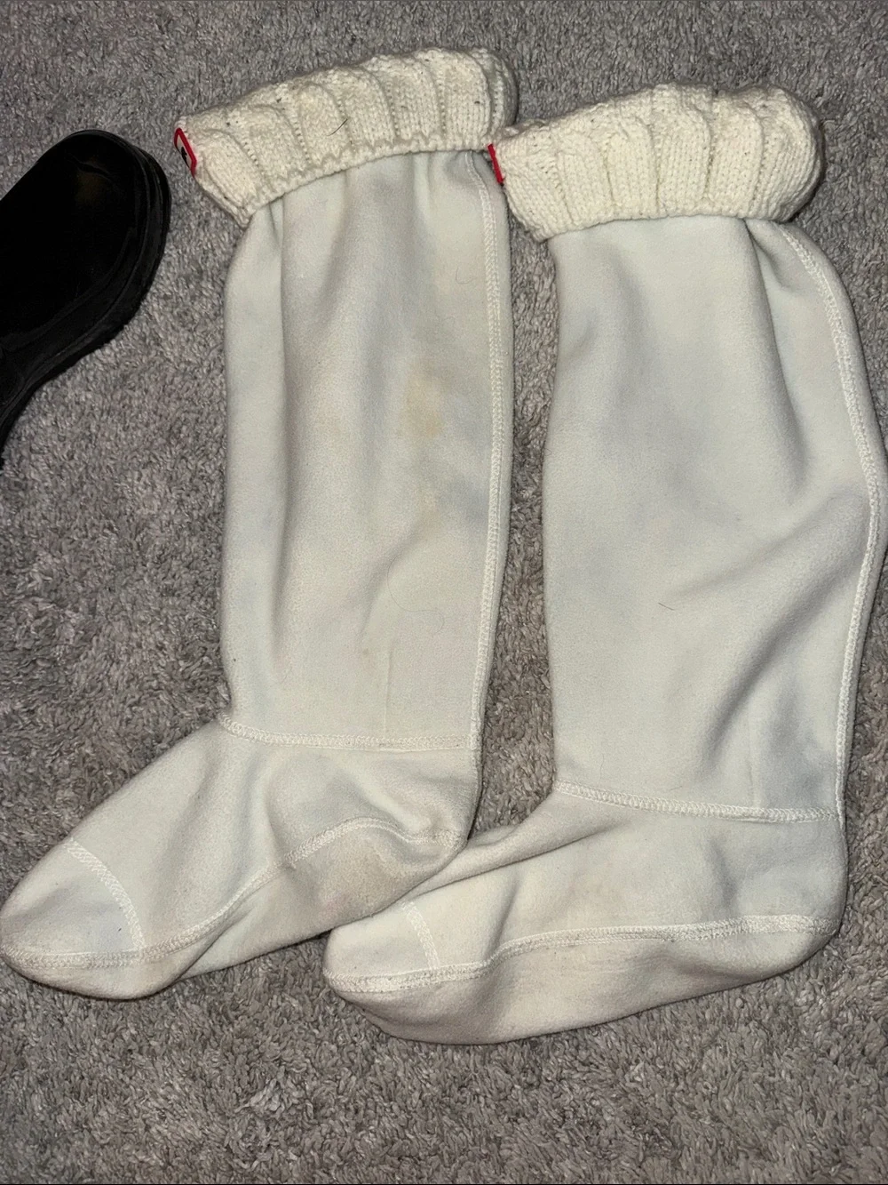 Hunter glossy tall black boots w/ cream sock insert. Collegiate waterproof cozy